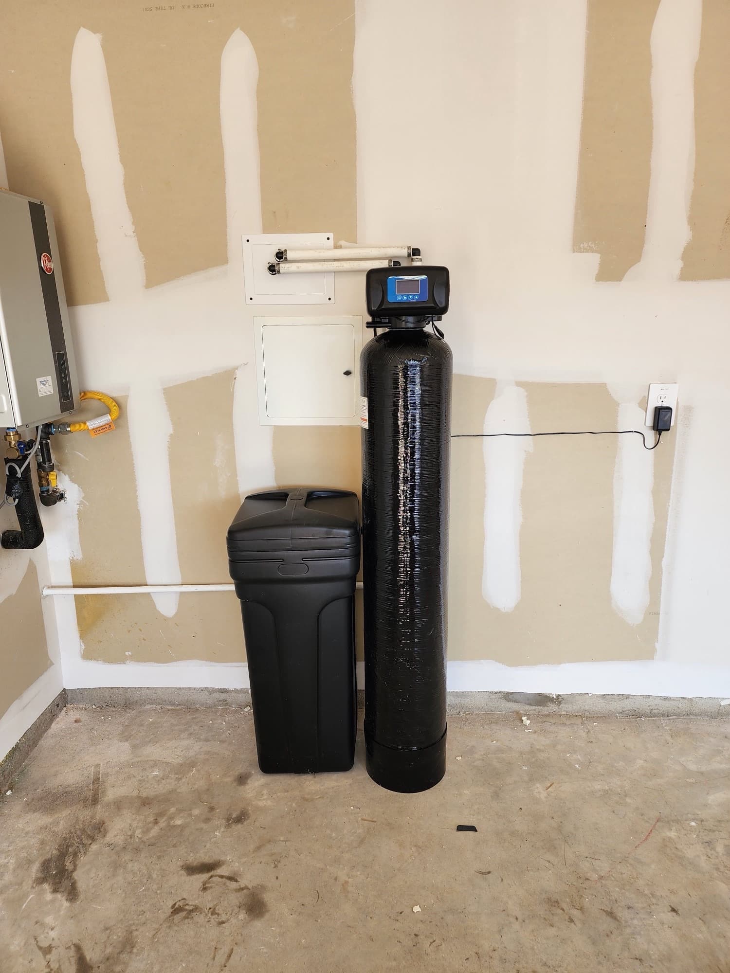 Water softener installed during construction, before the garage walls were finished