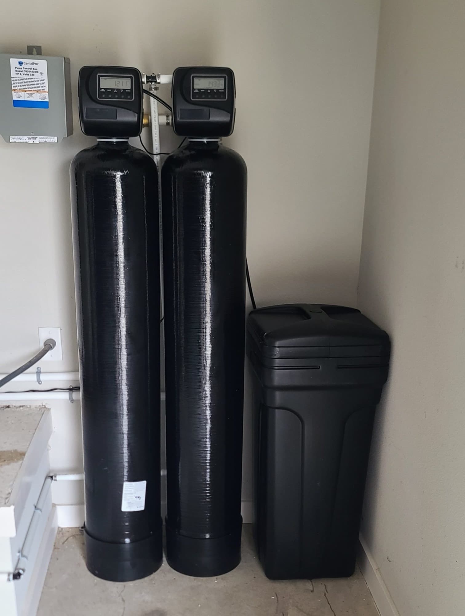 Dual tank Honest Water Co system with two control valves and a brine tank